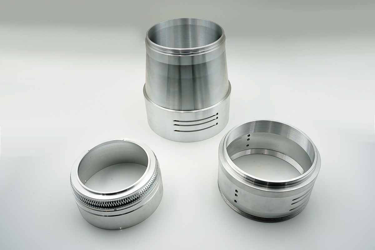 Telephoto lens housing parts