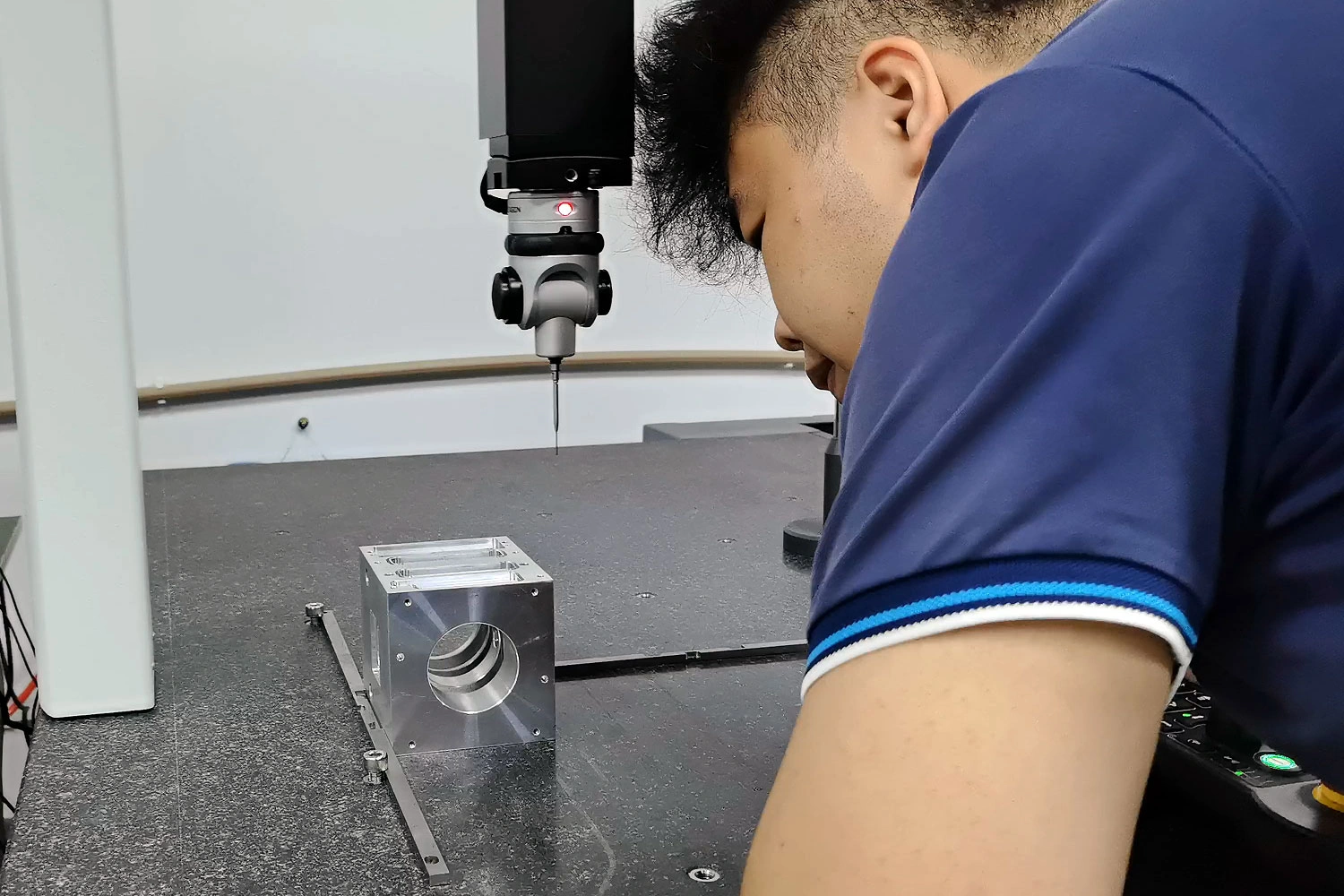 The-technicians-are-inspecting-the-precision-machined-parts