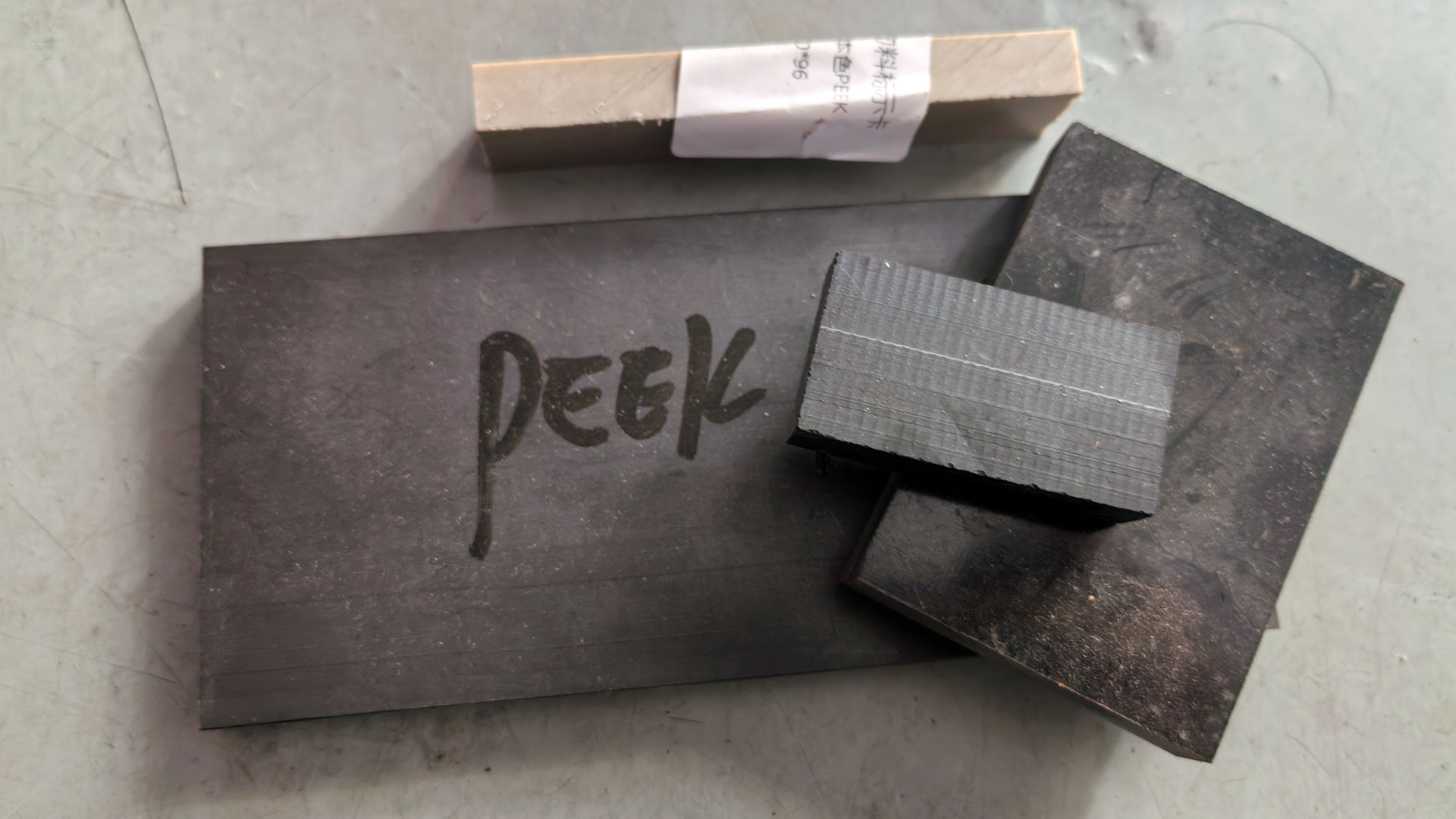 An arrangement of PEEK material samples in different grades and forms